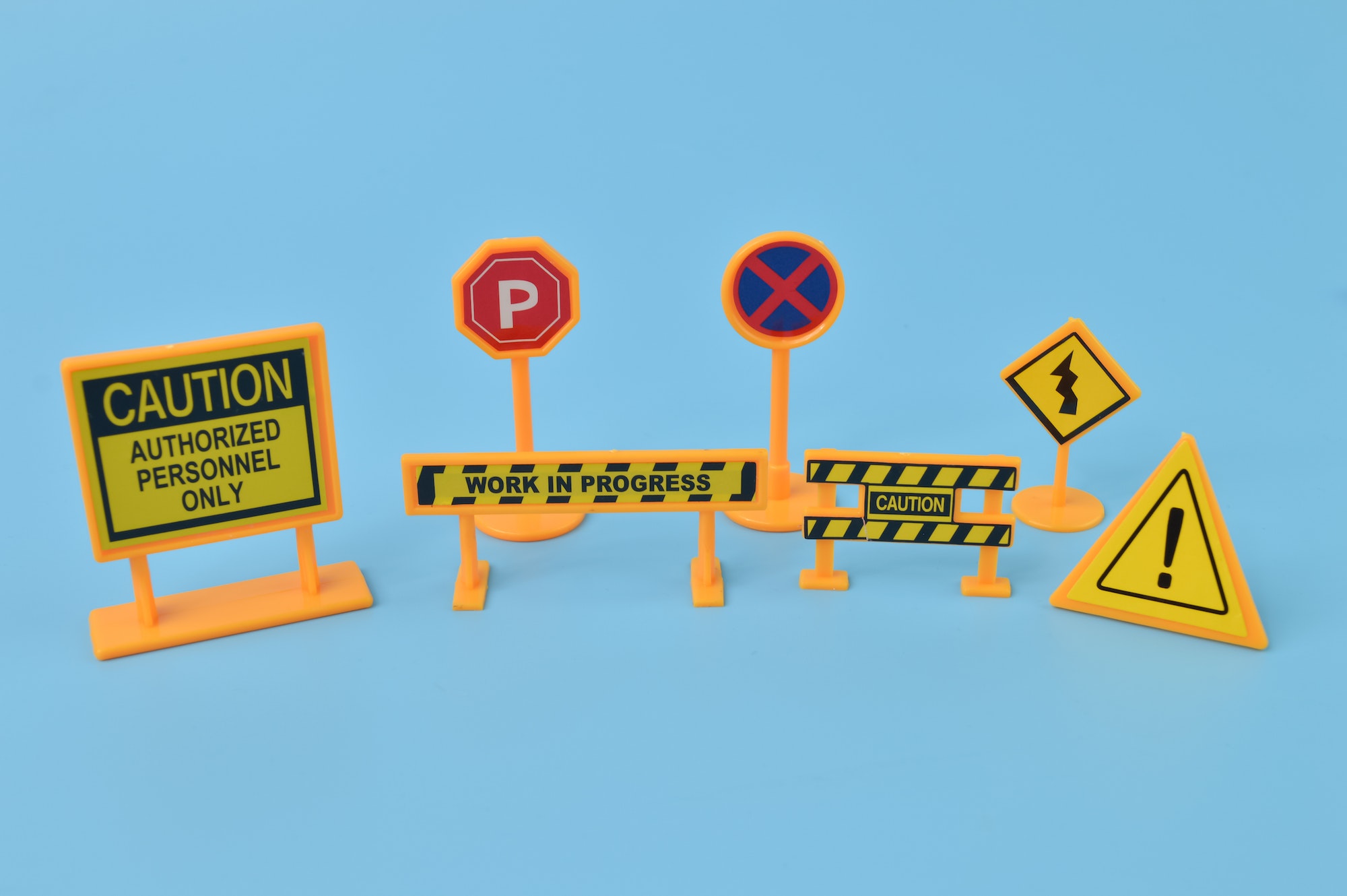 Set of road signs and maintenance signs isolated on a blue background