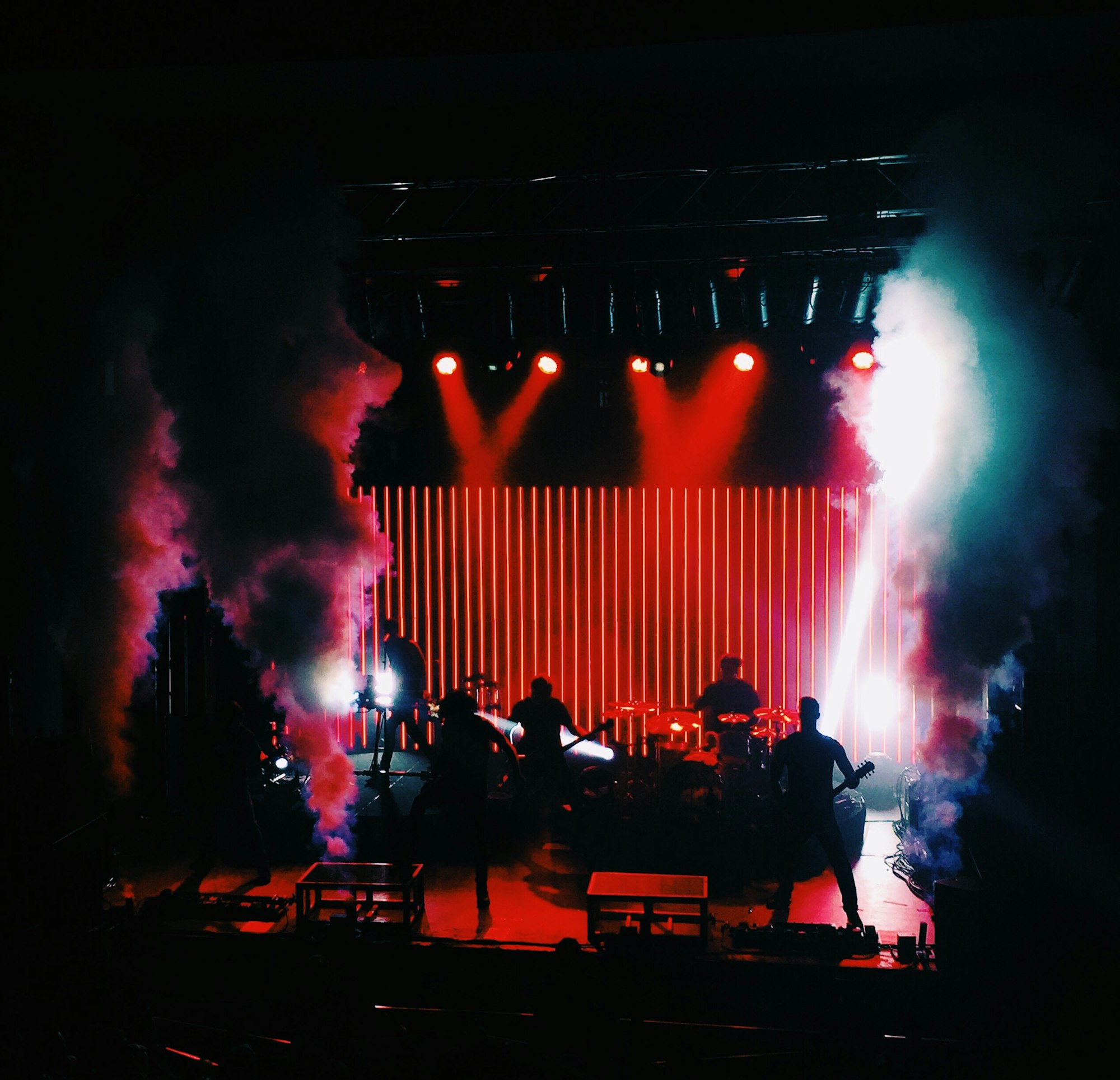 Silhouettes of musicians on stage